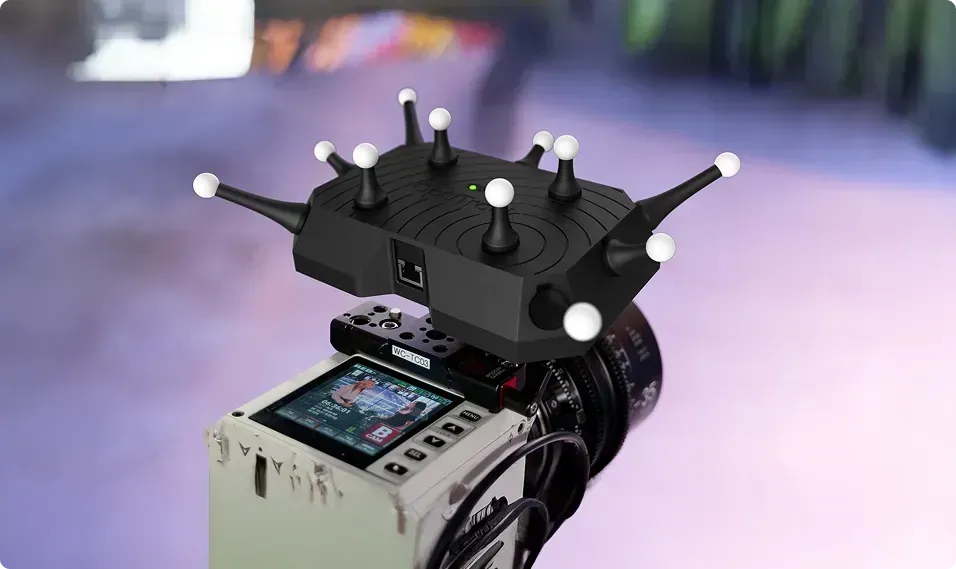 Wired CinePuck on top of a cinema camera.